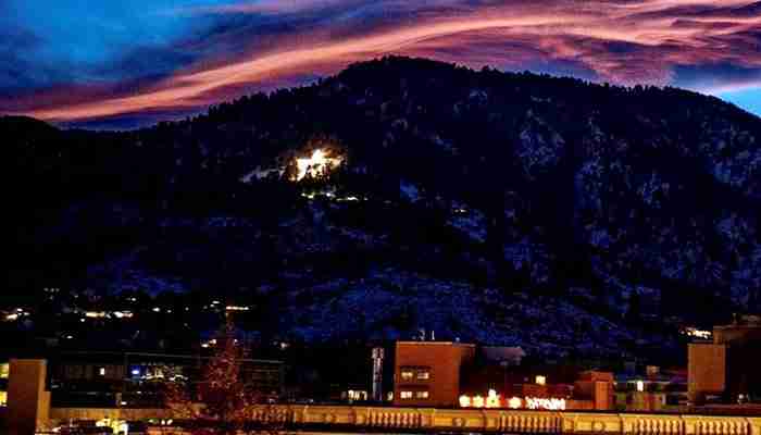 Image of the Boulder Star above the City of Boulder.